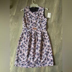 Floral Sleeveless Dress with Bow Accent size 8. New with tag
